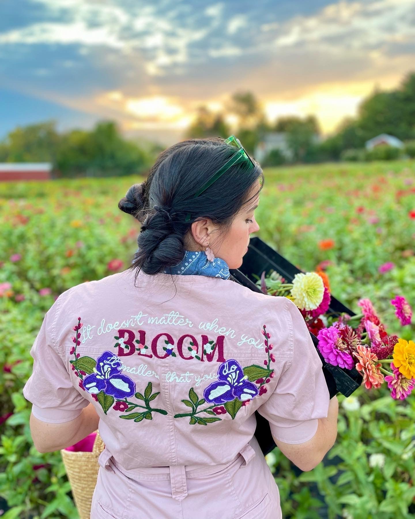 lavender jumpsuit chainstitch embroidered with text and flowers